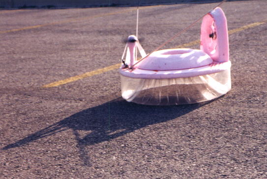 model hovercraft in parking lot